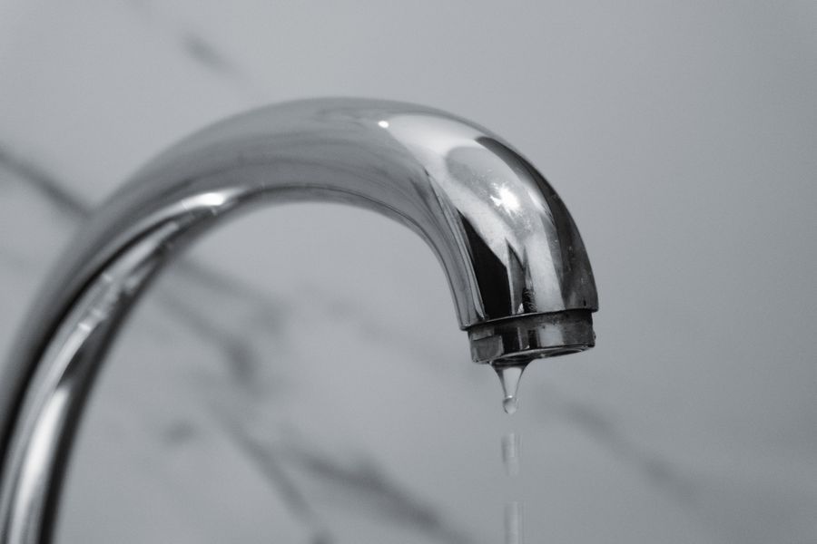 Water dripping from a faucet