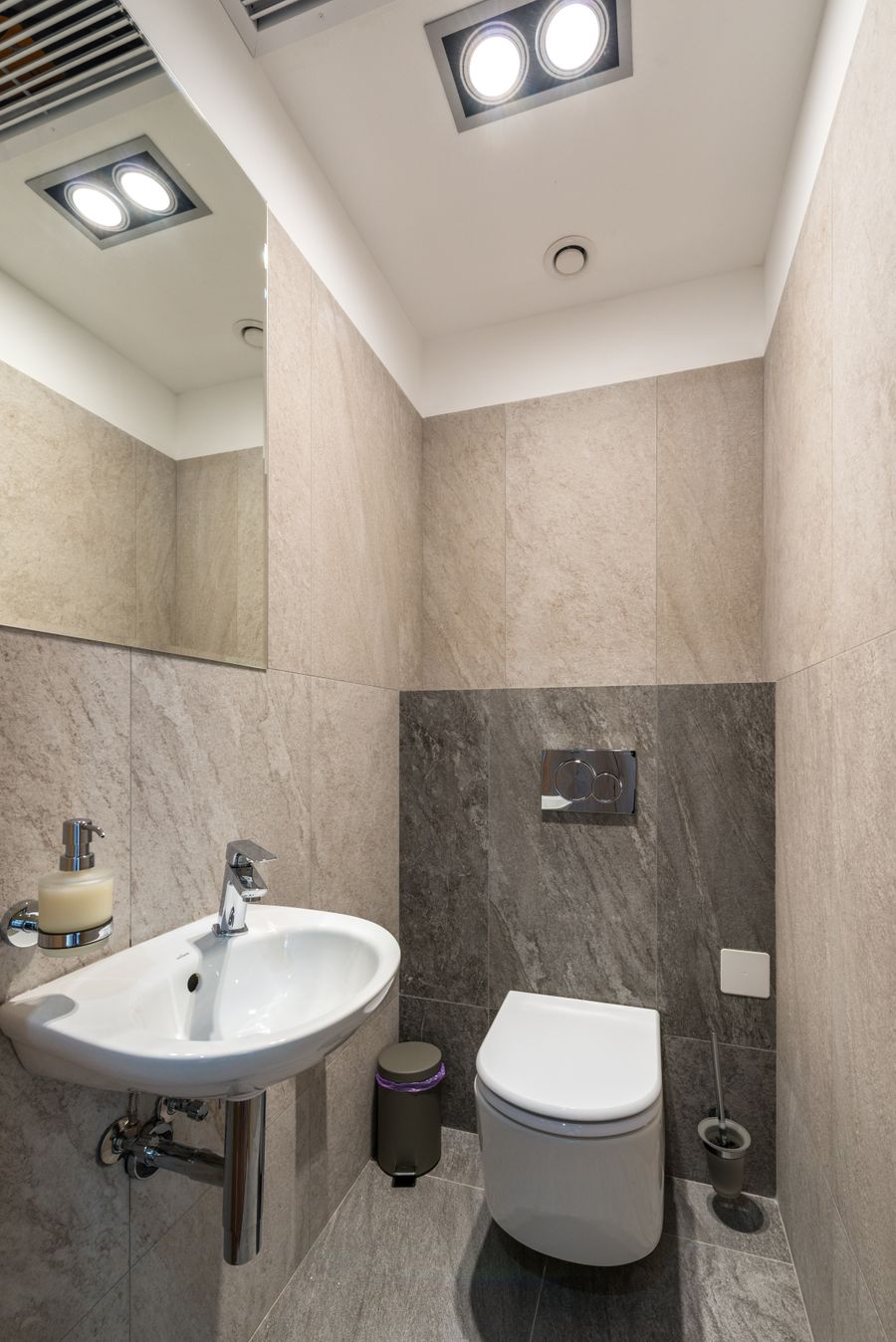 Modern bathroom with toilet and sink
