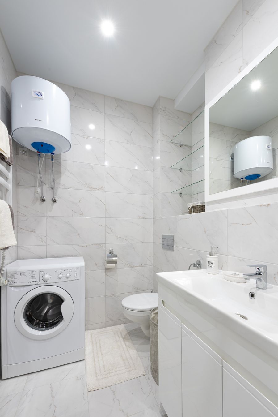 Residential water heater installed in a bathroom